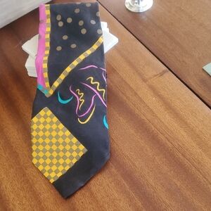 Men's Black Patterned Silk Tie with Yellow, Pink and Teal Accents.